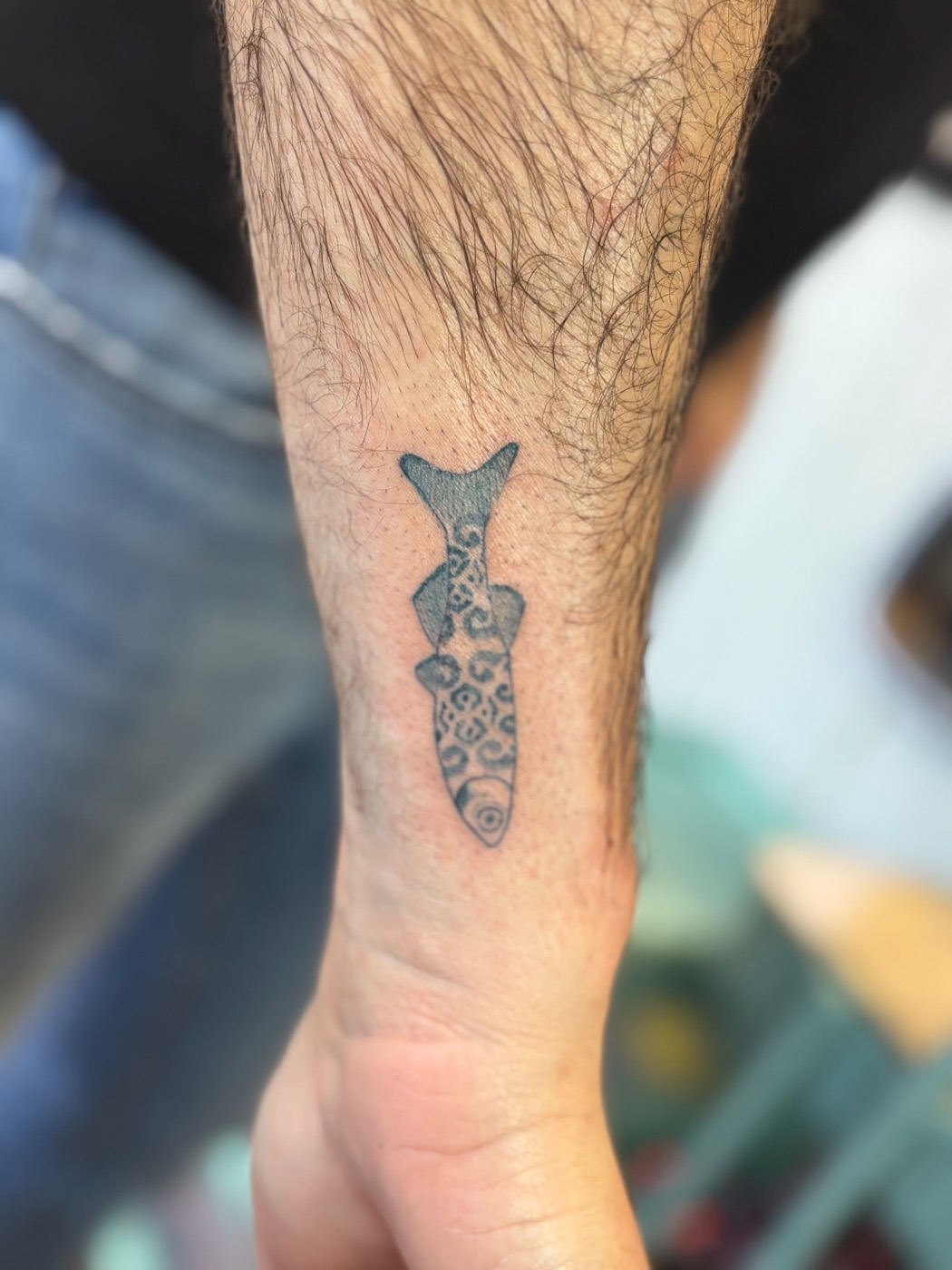 Ornamental fish blackwork tattoo by Caitlyn Barbosa