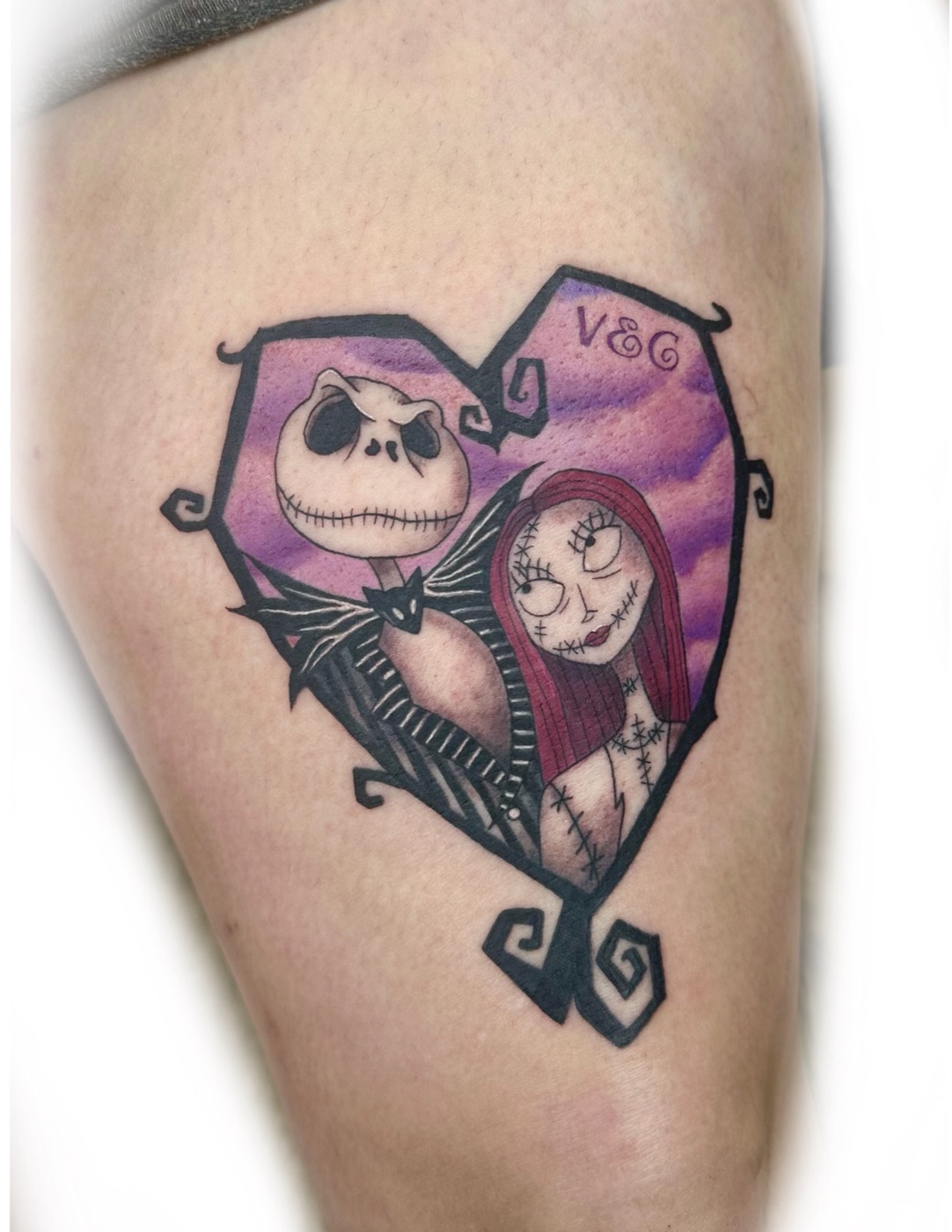 Jack Skellington and Sally heart frame color tattoo by Hanna McCoy