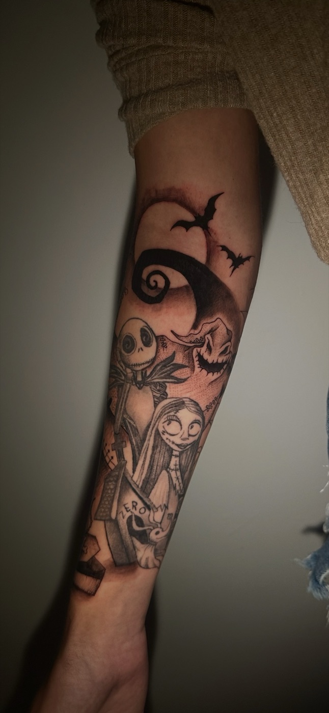 Nightmare Before Christmas black and grey sleeve tattoo by Hanna McCoy