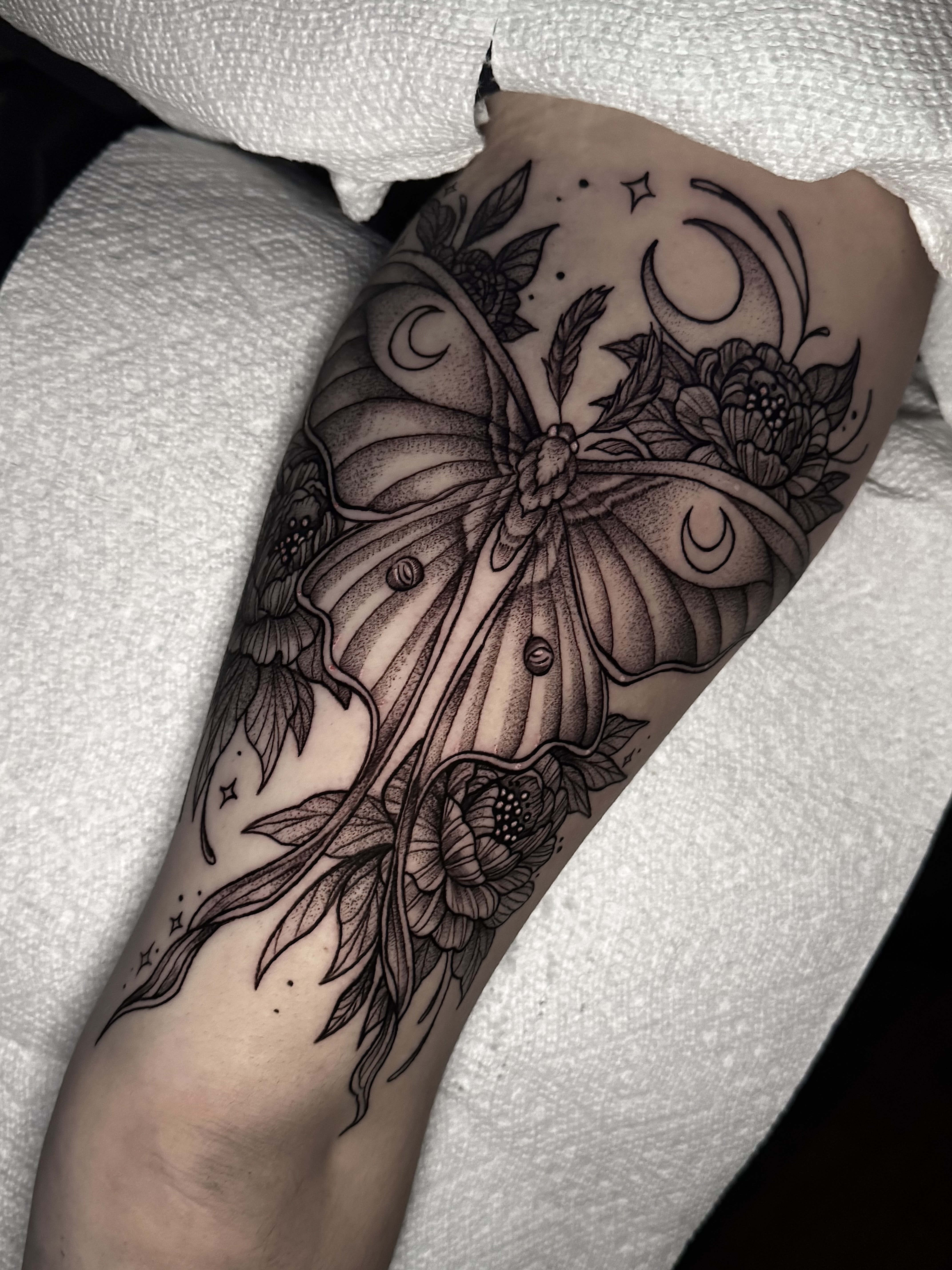 Luna moth with flowers and moon tattoo in New Bedford