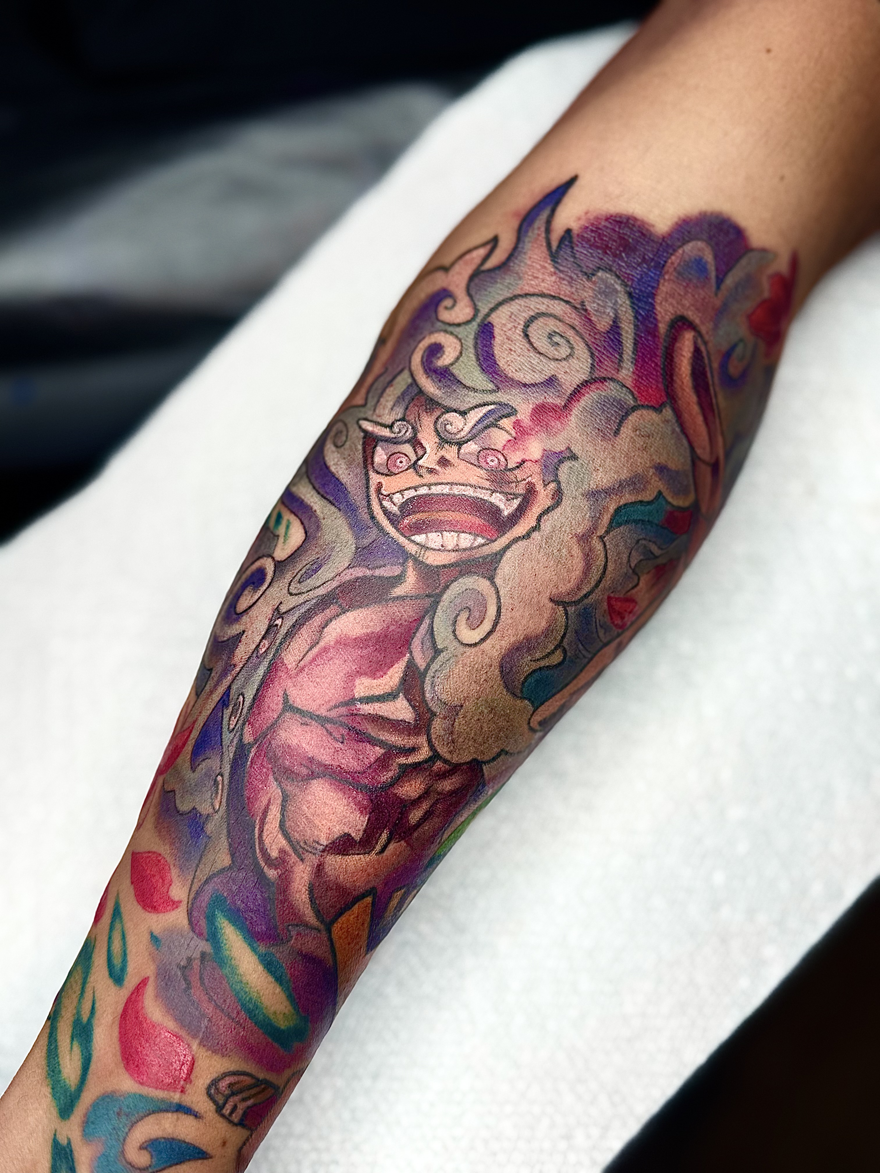 One Piece Luffy Gear 5 anime tattoo by Julia Harley