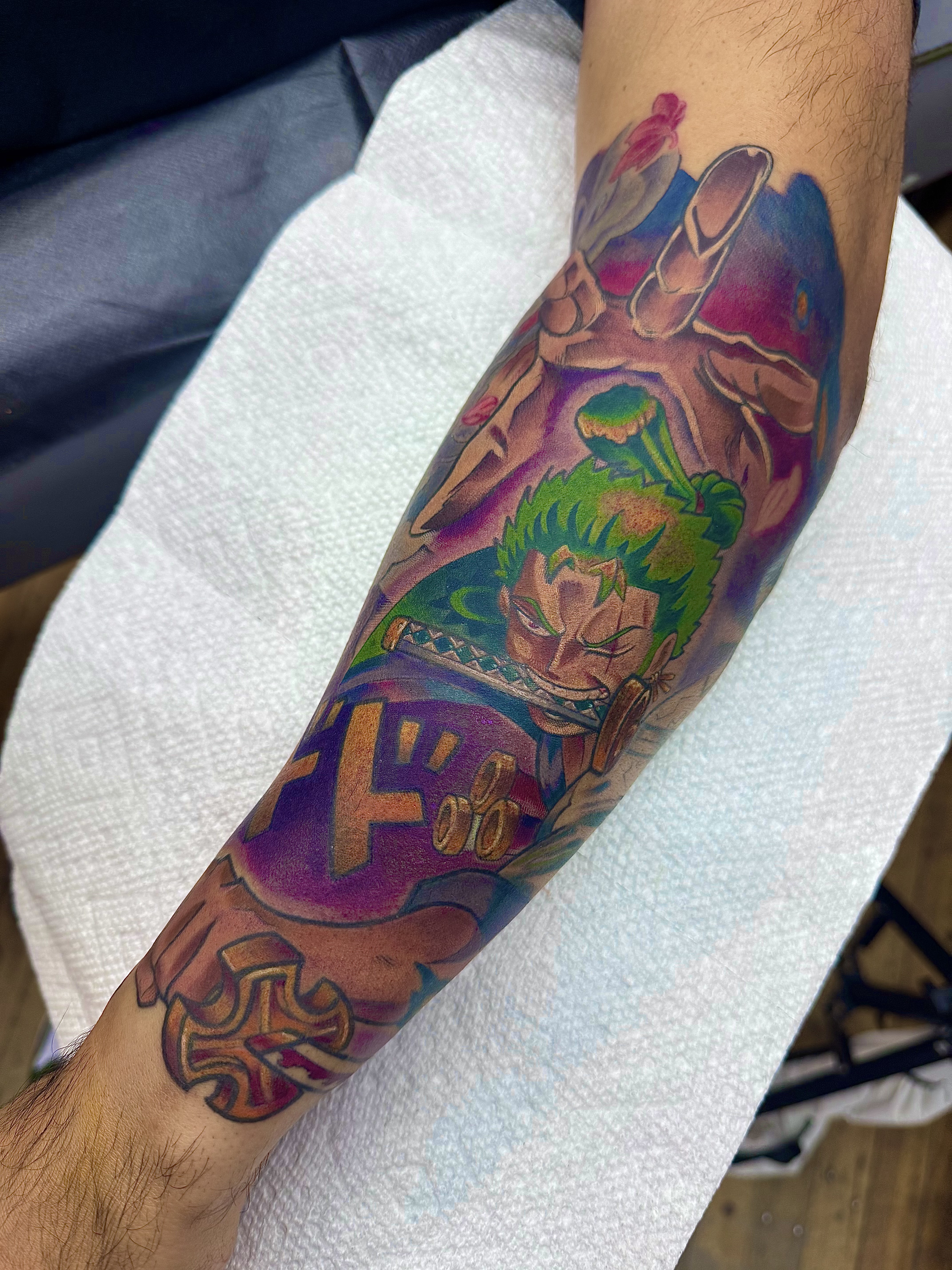 One Piece Zoro anime sleeve tattoo by Julia Harley
