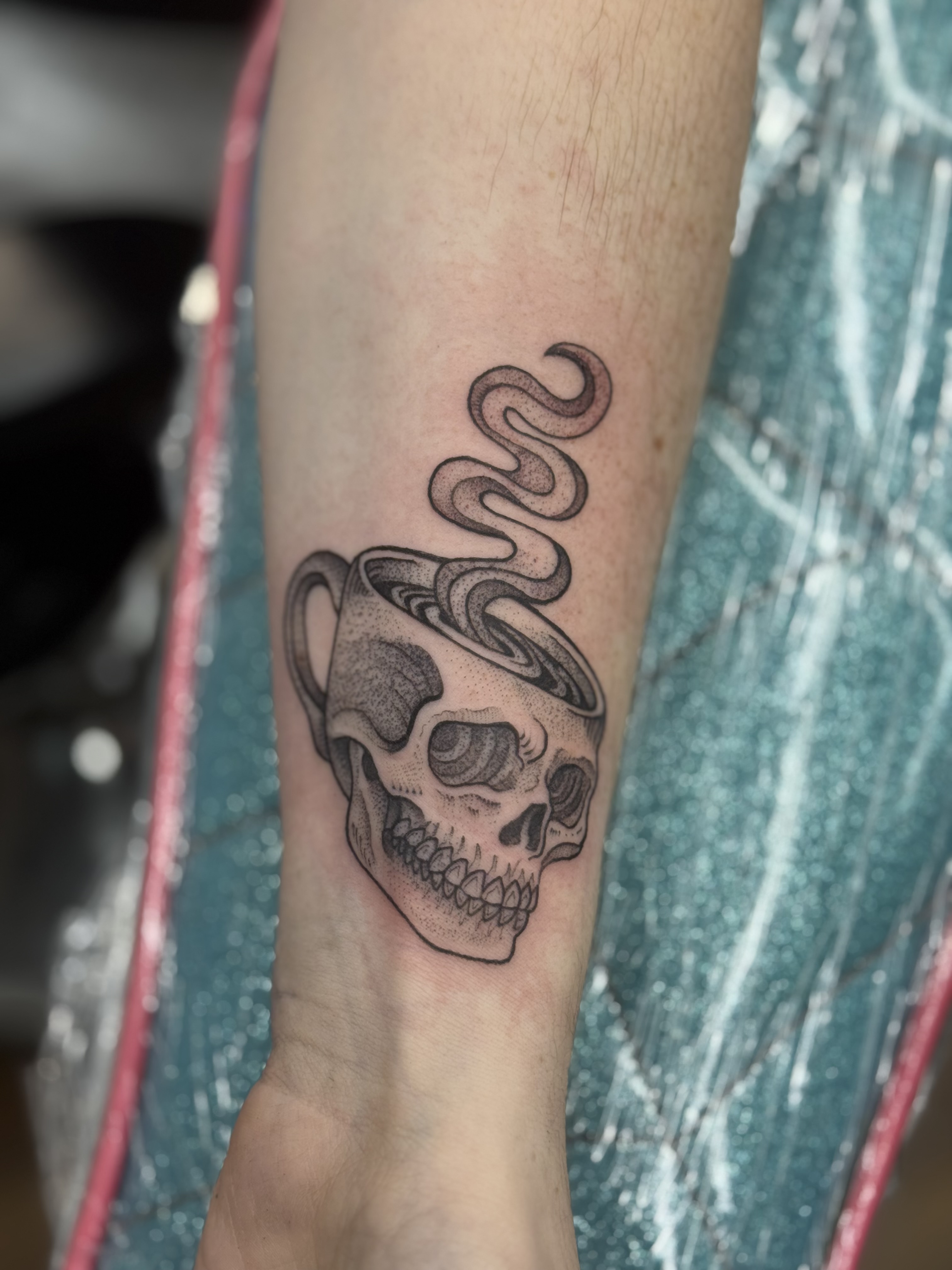 Skull coffee cup blackwork tattoo by Julia Harley